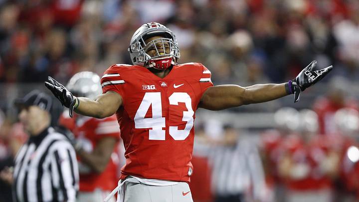 Nov 7, 2015; Columbus, OH, USA; Ohio State Buckeyes linebacker Darron Lee (43) gets the crowd fired up during first quarter action versus the Minnesota Golden Gophers at Ohio Stadium. Ohio State leads 14-0 at halftime. Mandatory Credit: Joe Maiorana-Imagn Images