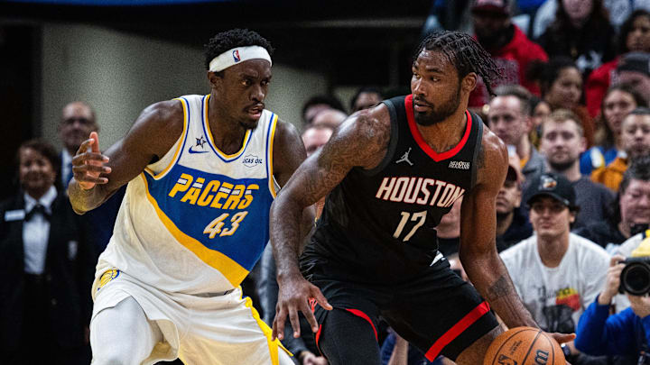 Feb 2, 2026; Indianapolis, Indiana, USA;  Houston Rockets forward Tari Eason (17) dribbles the ball while Indiana Pacers forward Pascal Siakam (43) defends in the second half at Gainbridge Fieldhouse. Mandatory Credit: Trevor Ruszkowski-Imagn Images