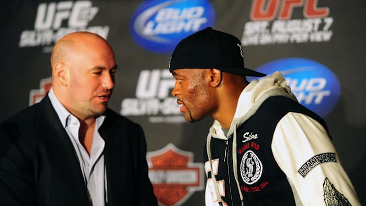 Aug. 7, 2010; Oakland, CA, USA; UFC president Dana White (left) congratulates Anderson Silva (right) after defeating Chael Sonnen (not pictured) during the middleweight title bout in UFC 117 at the Oracle Arena. Mandatory Credit: Mark J. Rebilas-Imagn Images