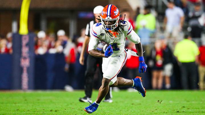 Nov 15, 2025; Oxford, Mississippi, USA; Florida Gators wide receiver TJ Abrams (4) runs for yards after the catch against the Mississippi Rebels during the second quarter at Vaught-Hemingway Stadium. Mandatory Credit: Petre Thomas-Imagn Images Nov 15, 2025; Oxford, Mississippi, USA; Florida Gators wide receiver TJ Abrams (4) runs for yards after the catch against the Mississippi Rebels during the second quarter at Vaught-Hemingway Stadium. Mandatory Credit: Petre Thomas-Imagn Images