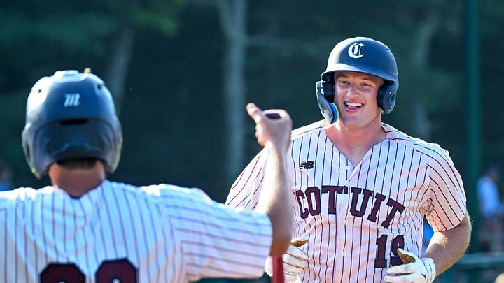 Caden Bogenpohl (19) celebrates with Cotuit teammate Ryne Farber (33) after hitting a three run homer against Y-D Cape League baseball
July 1 2025