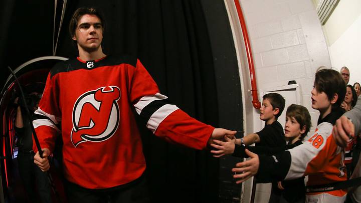 New Jersey Devils center Nico Hischier (13) greets fans after the New Jersey Devils 4-3 win over the Philadelphia Flyers at Prudential Center. Mandatory Credit: Ed Mulholland-USA TODAY Sports