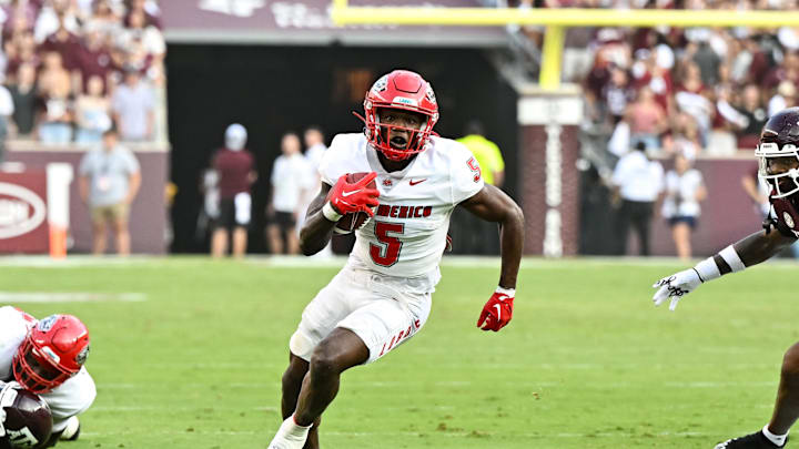 Sep 2, 2023; College Station, Texas, USA; New Mexico Lobos running back Jacory Croskey-Merritt (5) runs the ball during the first half against the Texas A&M Aggies at Kyle Field. Mandatory Credit: Maria Lysaker-USA TODAY Sports