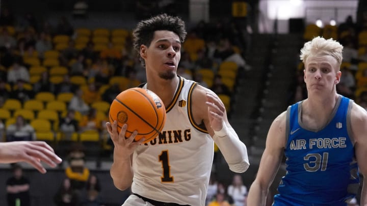 Mar 5, 2024; Laramie, Wyoming, USA; Wyoming Cowboys guard Brendan Wenzel (1) drives against Air