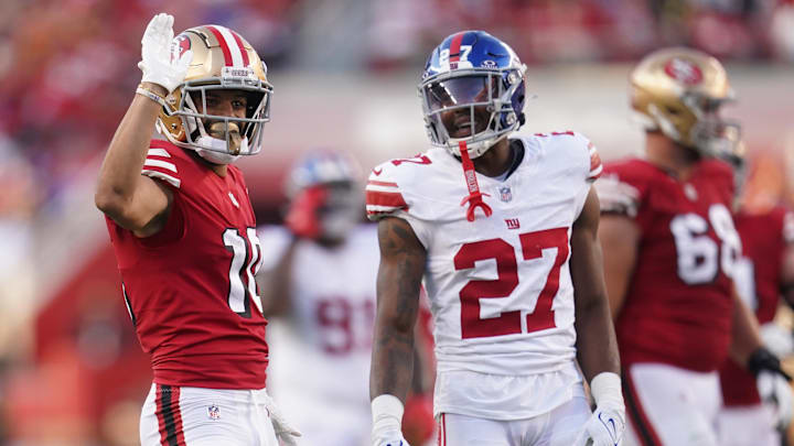 Sep 21, 2023; Santa Clara, California, USA; San Francisco 49ers wide receiver Ronnie Bell (10) gestures after making a catch for a first down in front of New York Giants safety Jason Pinnock (27) in the second quarter at Levi's Stadium. Mandatory Credit: Cary Edmondson-Imagn Images