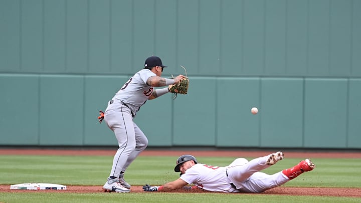 Jun 2, 2024; Boston, Massachusetts, USA;  Boston Red Sox right fielder Wilyer Abreu (52) slides safe into second base covered by Detroit Tigers shortstop Javier Baez (28) during the first inning at Fenway Park. Mandatory Credit: Eric Canha-USA TODAY Sports