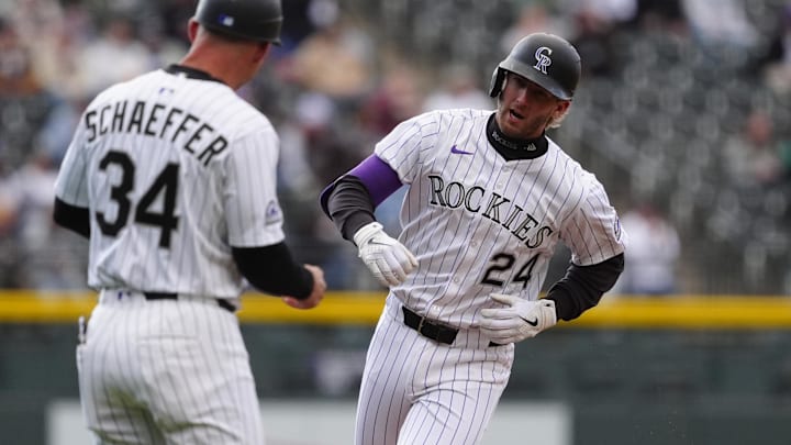 Colorado Rockies third base Ryan McMahon (24) runs off a two run home run in the first inning against the Detroit Tigers at Coors Field on May 7.