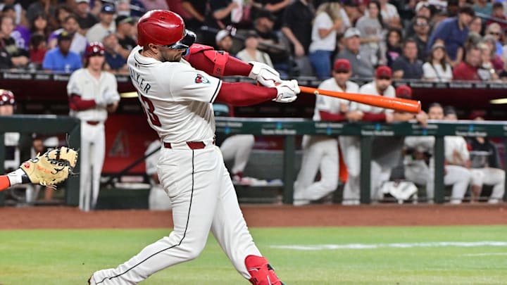 Sep 25, 2024; Phoenix, Arizona, USA; Arizona Diamondbacks first base Christian Walker (53) doubles in the second inning against the San Francisco Giants at Chase Field.