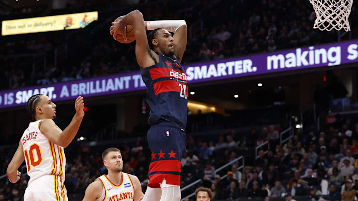 Nov 25, 2025; Washington, District of Columbia, USA; Washington Wizards center Alex Sarr (20) dunks the ball as Atlanta Hawks forward Zaccharie Risacher (10) looks on in the second half at Capital One Arena. Mandatory Credit: Geoff Burke-Imagn Images Nov 25, 2025; Washington, District of Columbia, USA; Washington Wizards center Alex Sarr (20) dunks the ball as Atlanta Hawks forward Zaccharie Risacher (10) looks on in the second half at Capital One Arena. Mandatory Credit: Geoff Burke-Imagn Images