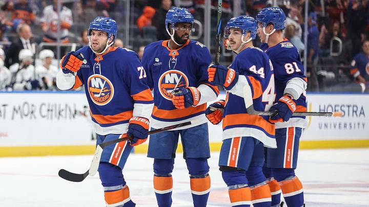 Oct 10, 2026; Elmont, New York, USA;  New York Islanders defenseman Tony DeAngelo (77) celebrates with teammates after scoring a goal in the second period against the Tampa Bay Lightning at UBS Arena.  Mandatory Credit: Wendell Cruz-Imagn Images