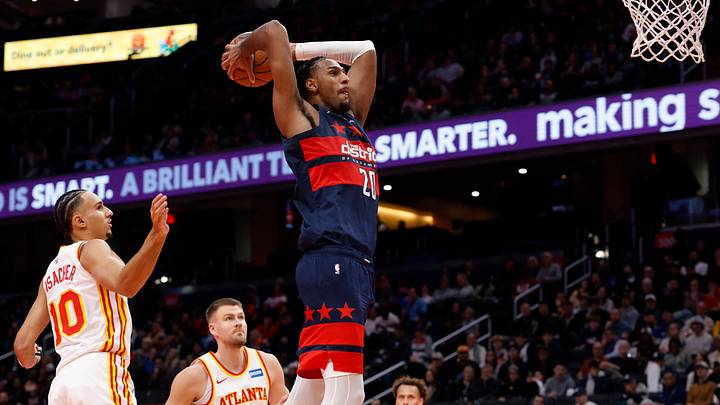 Nov 25, 2025; Washington, District of Columbia, USA; Washington Wizards center Alex Sarr (20) dunks the ball as Atlanta Hawks forward Zaccharie Risacher (10) looks on in the second half at Capital One Arena. Mandatory Credit: Geoff Burke-Imagn Images Nov 25, 2025; Washington, District of Columbia, USA; Washington Wizards center Alex Sarr (20) dunks the ball as Atlanta Hawks forward Zaccharie Risacher (10) looks on in the second half at Capital One Arena. Mandatory Credit: Geoff Burke-Imagn Images