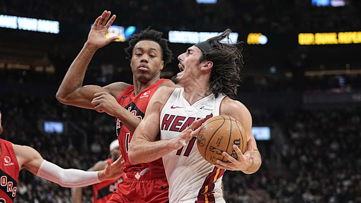 Dec 6, 2023; Toronto, Ontario, CAN; Miami Heat guard Jaime Jaquez Jr. (11) drives to the net against Scottie Barnes