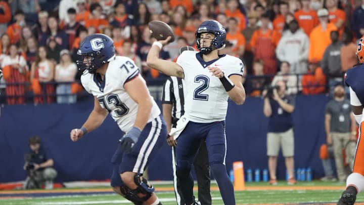 Sep 6, 2025; Syracuse, New York, USA; UConn Huskies quarterback Joe Fagnano (2) throws against the Syracuse Orange during the first half at JMA Wireless Dome. Mandatory Credit: Gregory Fisher-Imagn Images