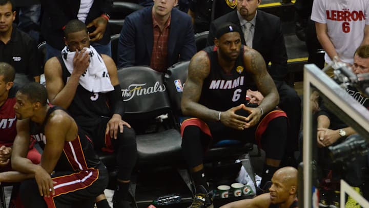 Jun 15, 2014; San Antonio, TX, USA; Miami Heat forward LeBron James (6) sits on the bench at the end of the game against the San Antonio Spurs in game five of the 2014 NBA Finals at AT&T Center. The Spurs defeated the Heat 104-87 to win the NBA Finals. Mandatory Credit: Brendan Maloney-Imagn Images Jun 15, 2014; San Antonio, TX, USA; Miami Heat forward LeBron James (6) sits on the bench at the end of the game against the San Antonio Spurs in game five of the 2014 NBA Finals at AT&T Center. The Spurs defeated the Heat 104-87 to win the NBA Finals. Mandatory Credit: Brendan Maloney-Imagn Images