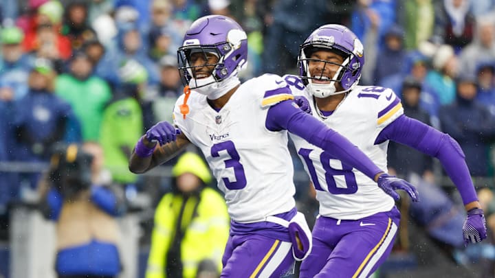 Dec 22, 2024; Seattle, Washington, USA; Minnesota Vikings wide receiver Jordan Addison (3) celebrates with wide receiver Justin Jefferson (18) after catching a touchdown pass against the Seattle Seahawks during the first quarter at Lumen Field. Mandatory Credit: Joe Nicholson-Imagn Images