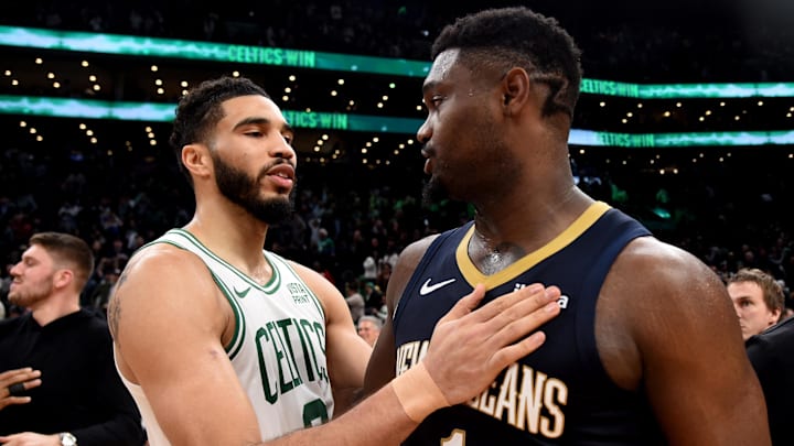 Jan 29, 2024; Boston, Massachusetts, USA;  Boston Celtics forward Jayson Tatum (0) and New Orleans Pelicans forward Zion Williamson (1) after the game at TD Garden. Mandatory Credit: Bob DeChiara-Imagn Images