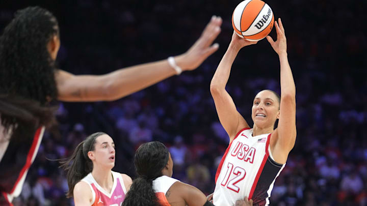 Team USA guard Diana Taurasi (12) looks to pass the ball against Team WNBA during the WNBA All-Star Game at Footprint Center in Phoenix on July 20, 2024.