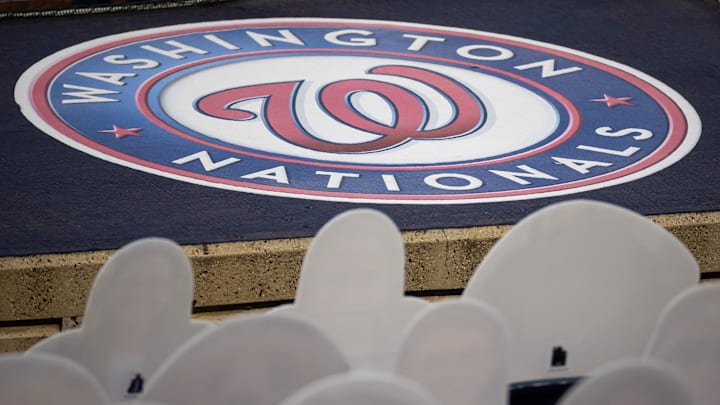Sep 11, 2020; Washington, District of Columbia, USA; A Washington Nationals logo is seen in front of cutouts of fans in the seats during the third inning of the game between the Washington Nationals and the Atlanta Braves at Nationals Park. Sep 11, 2020; Washington, District of Columbia, USA; A Washington Nationals logo is seen in front of cutouts of fans in the seats during the third inning of the game between the Washington Nationals and the Atlanta Braves at Nationals Park.