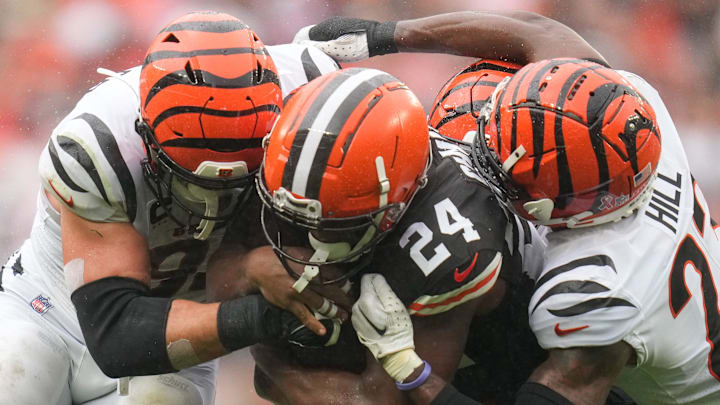 Cleveland Browns running back Nick Chubb (24) is wrapped up by Cincinnati Bengals defensive end Sam Cleveland Browns running back Nick Chubb (24) is wrapped up by Cincinnati Bengals defensive end Sam