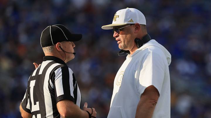 Dec 27, 2025; Orlando, FL, USA; Georgia Tech Yellow Jackets head coach Brent Key talks with the referee against the BYU Cougars during the first half at Camping World Stadium. Mandatory Credit: Kim Klement Neitzel-Imagn Images Dec 27, 2025; Orlando, FL, USA; Georgia Tech Yellow Jackets head coach Brent Key talks with the referee against the BYU Cougars during the first half at Camping World Stadium. Mandatory Credit: Kim Klement Neitzel-Imagn Images