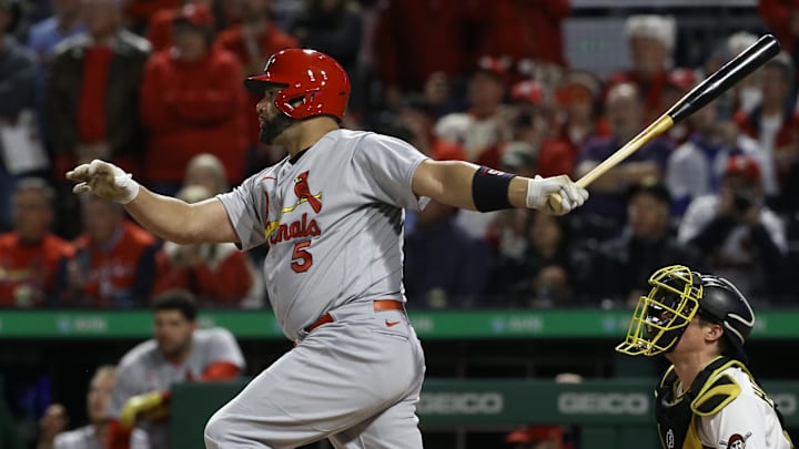 St. Louis Cardinals first baseman Albert Pujols (5) hits a two-run single against the Pittsburgh Pirates during the third inning at PNC Park in 2022. St. Louis Cardinals first baseman Albert Pujols (5) hits a two-run single against the Pittsburgh Pirates during the third inning at PNC Park in 2022.