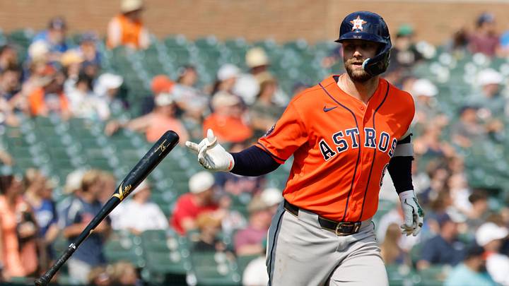 Houston Astros first baseman Christian Walker (8) flips his bat after he hits a three run home run tenth inning against the Detroit Tigers. Houston Astros first baseman Christian Walker (8) flips his bat after he hits a three run home run tenth inning against the Detroit Tigers.
