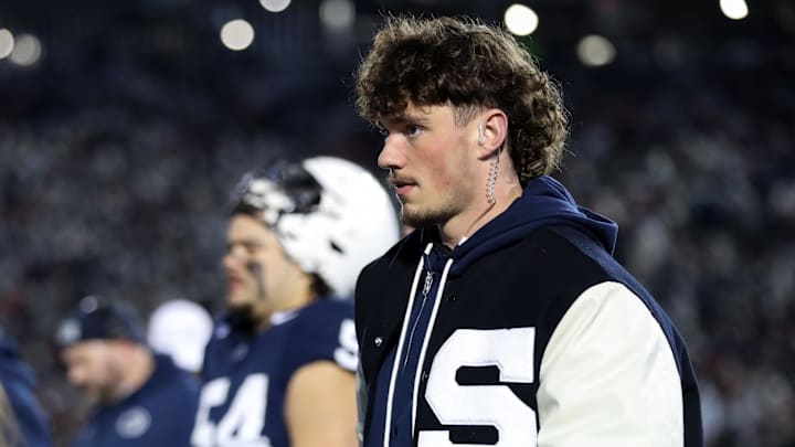 Nov 22, 2025; University Park, Pennsylvania, USA; Penn State Nittany Lions quarterback Drew Allar (15) walks on the sideline during the first quarter against the Nebraska Cornhuskers at Beaver Stadium. 