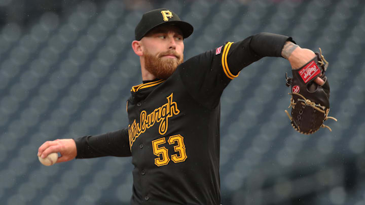 May 22, 2025; Pittsburgh, Pennsylvania, USA;  Pittsburgh Pirates starting pitcher Mike Burrows (53) delivers a pitch against the Milwaukee Brewers during the first inning at PNC Park. Mandatory Credit: Charles LeClaire-Imagn Images