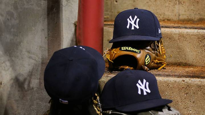 May 9, 2017; Cincinnati, OH, USA; A view of official New Era on field hats of the New York Yankees on the steps of the dugout at Great American Ball Park. Mandatory Credit: Aaron Doster-USA TODAY Sports