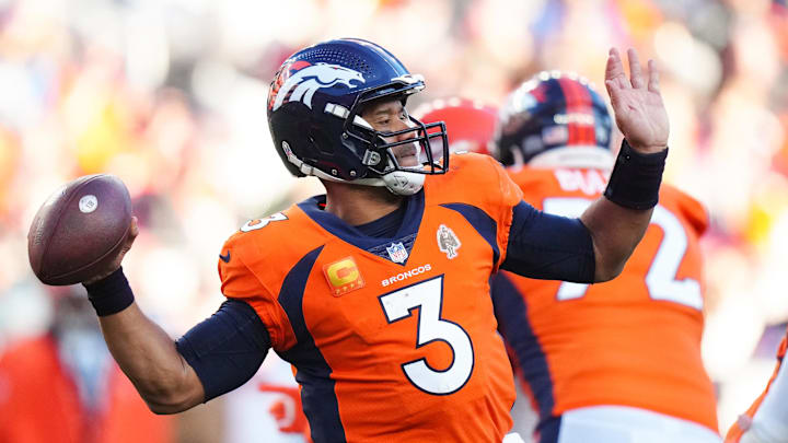 Nov 26, 2023; Denver, Colorado, USA; Denver Broncos quarterback Russell Wilson (3) throws the ball