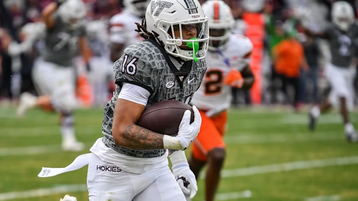 Nov 22, 2025; Blacksburg, Va.; Virginia Tech running back Jeffrey Overton (16) runs the ball for a touchdown during the third quarter at Lane Stadium. Nov 22, 2025; Blacksburg, Va.; Virginia Tech running back Jeffrey Overton (16) runs the ball for a touchdown during the third quarter at Lane Stadium.