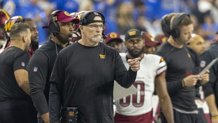 Jan 18, 2025; Detroit, Michigan, USA;  Washington Commanders head coach Dan Quinn looks on during the second half against Detroit Lions at Ford Field. Mandatory Credit: David Reginek-Imagn Images