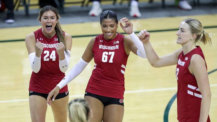 Wisconsin's Charlie Fuerbringer (24), Halle Thompson (67) and Natalie Wardlow (12) celebrate after a kill by Eva Travis (5) during an exhibition match on Saturday, April 18, 2026, at the Kress Center in Green Bay, Wis. Wisconsin won all five sets of the match.
Tork Mason/USA TODAY NETWORK-Wisconsin