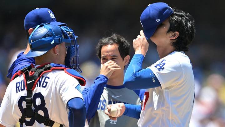 Jun 17, 2026; Los Angeles, California, USA; Los Angeles Dodgers starting pitcher Shohei Ohtani (17) adjusts his cap as he meets with catcher Dalton Rushing (68), pitching coach Mark Prior (99) and translator Will Ireton on the mound in the fifth inning against the Tampa Bay Rays at Dodger Stadium. Mandatory Credit: Jayne Kamin-Oncea-Imagn Images Jun 17, 2026; Los Angeles, California, USA; Los Angeles Dodgers starting pitcher Shohei Ohtani (17) adjusts his cap as he meets with catcher Dalton Rushing (68), pitching coach Mark Prior (99) and translator Will Ireton on the mound in the fifth inning against the Tampa Bay Rays at Dodger Stadium. Mandatory Credit: Jayne Kamin-Oncea-Imagn Images