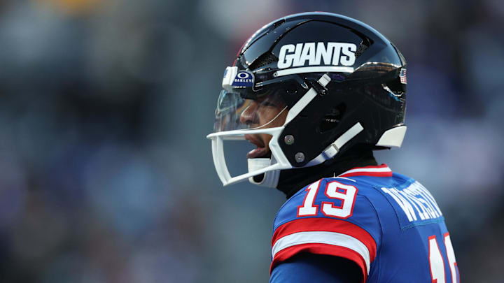 Dec 14, 2025; East Rutherford, New Jersey, USA;  New York Giants quarterback Jameis Winston (19) looks on during the fourth quarter against the Washington Commanders at MetLife Stadium. Mandatory Credit: Vincent Carchietta-Imagn Images