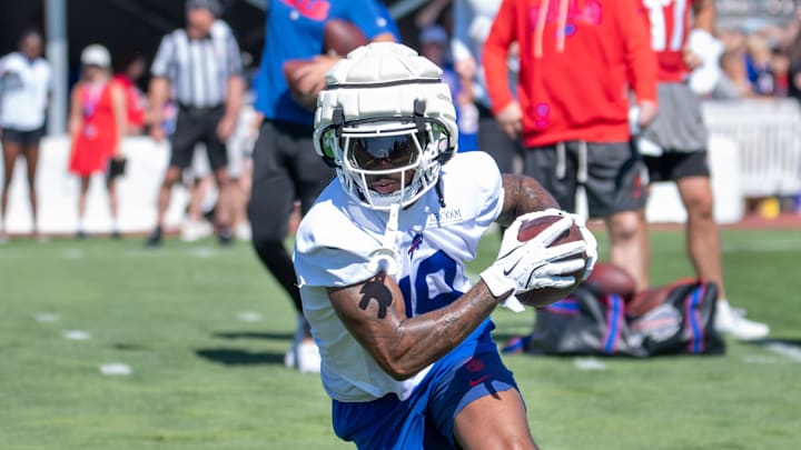 Jul 23, 2025; Rochester, NY, USA; Buffalo Bills wide receiver Elijah Moore (18) turns up field after catching a pass during training camp at St. John Fisher University. Mandatory Credit: Mark Konezny-Imagn Images