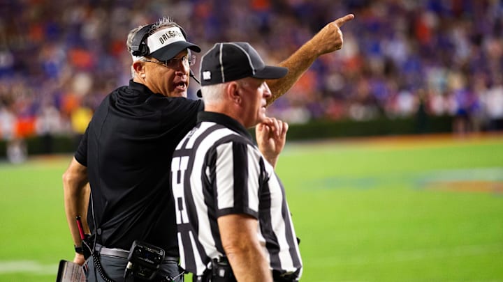 UCF Knights head coach Gus Malzahn questions a call during the second half at Ben Hill Griffin Stadium in Gainesville, FL on Saturday, October 5, 2024. [Doug Engle/Gainesville Sun]