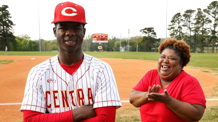 Clarke Central's Rio Foster poses for a photo with his super fan mom Iris Cleveland before a high school baseball game. Clarke Central's Rio Foster poses for a photo with his super fan mom Iris Cleveland before a high school baseball game.