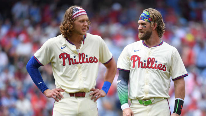Jul 14, 2024; Philadelphia, Pennsylvania, USA; Philadelphia Phillies third baseman Alec Bohm (28) and  first baseman Bryce Harper (3) in between innings against the Oakland Athletics at Citizens Bank Park. Mandatory Credit: Eric Hartline-Imagn Images