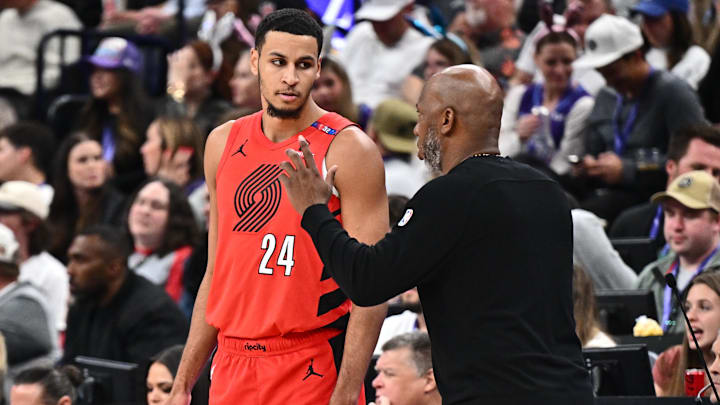 Apr 9, 2025; Salt Lake City, Utah, USA;  Portland Trail Blazers forward Kris Murray (24) gets instructions from head coach Chancey Billups in the second half against the Utah Jazz at Delta Center. Mandatory Credit: Jamie Sabau-Imagn Images