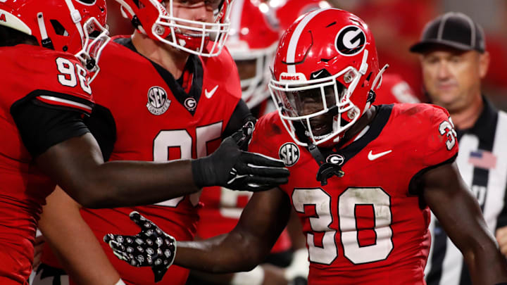 Georgia running back Daijun Edwards (30) celebrates after scoring a touchdown during the first half