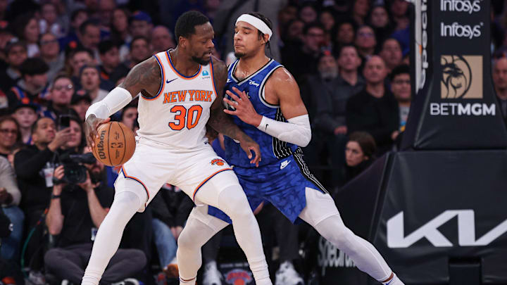 Jan 15, 2024; New York, New York, USA; New York Knicks forward Julius Randle (30) dribbles while defended by Orlando Magic forward Chuma Okeke (3) during the first half at Madison Square Garden. Mandatory Credit: Vincent Carchietta-Imagn Images