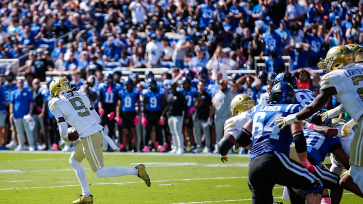 Oct 18, 2025; Durham, North Carolina, USA; Georgia Tech Yellow Jackets defensive back Omar Daniels (9) recovers a fumble and runs for a touchdown during the first half of the game against Duke Blue Devils at Wallace Wade Stadium. Mandatory Credit: Jaylynn Nash-Imagn Images