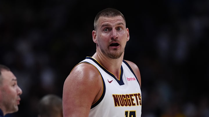 Apr 11, 2025; Denver, Colorado, USA; Denver Nuggets center Nikola Jokic (15) reacts in the fourth quarter against the Memphis Grizzlies at Ball Arena. Mandatory Credit: Ron Chenoy-Imagn Images Apr 11, 2025; Denver, Colorado, USA; Denver Nuggets center Nikola Jokic (15) reacts in the fourth quarter against the Memphis Grizzlies at Ball Arena. Mandatory Credit: Ron Chenoy-Imagn Images