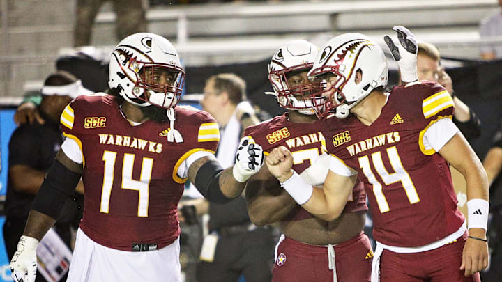 The ULM Warhawks opened their 2024 season on a rainy Thursday night in Malone Stadium. Bryant Vincent secured his first win as the new head coach of the Warhawks as they defeated the Jackson State Tigers , 30-14.