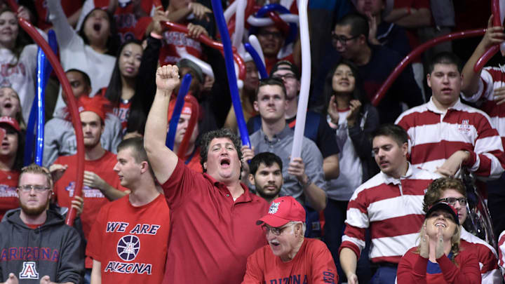 Jan 14, 2016; Tucson, AZ, USA; Arizona Wildcats fans cheer during the second half against the Washington Huskies at McKale Center. Arizona won 99-67. Mandatory Credit: Casey Sapio-Imagn Images