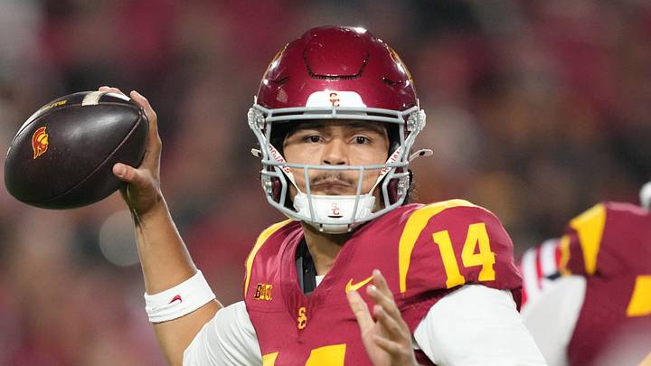 Sep 12, 2026; Los Angeles, California, USA; Southern California Trojans quarterback Jayden Maiava (14) throws the ball against the Louisiana Ragin' Cajuns in the first half at United Airlines Field at Los Angeles Memorial Coliseum. Mandatory Credit: Kirby Lee-Imagn Images Sep 12, 2026; Los Angeles, California, USA; Southern California Trojans quarterback Jayden Maiava (14) throws the ball against the Louisiana Ragin' Cajuns in the first half at United Airlines Field at Los Angeles Memorial Coliseum. Mandatory Credit: Kirby Lee-Imagn Images