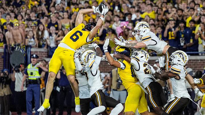 JJ Buchanan hauled in a Hail Mary to put Michigan past Western Michigan after a deeply controversial clock decision. JJ Buchanan hauled in a Hail Mary to put Michigan past Western Michigan after a deeply controversial clock decision.