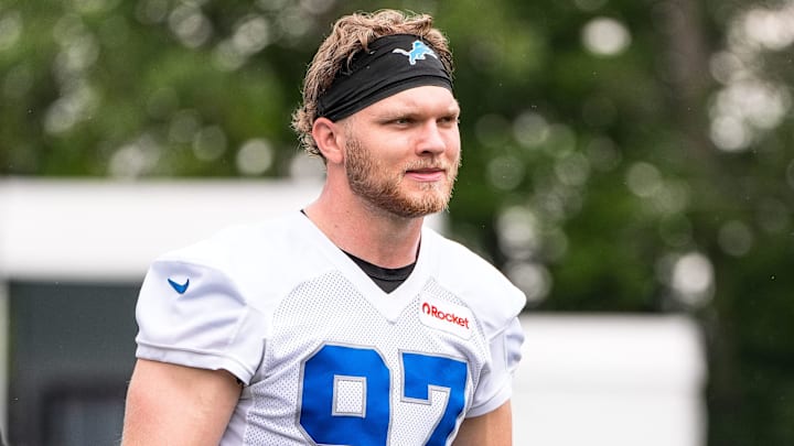 Detroit Lions defensive end Aidan Hutchinson (97) walks off the field after practice during training camp at Meijer Performance Center in Allen Park on Sunday, July 20, 2025.