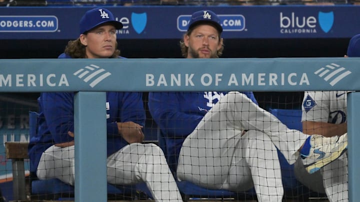 Sep 17, 2025; Los Angeles, California, USA;  Los Angeles Dodgers starting pitcher Tyler Glasnow (31) and starting pitcher Clayton Kershaw (22) look on from the dugout in the sixth inning against the Philadelphia Phillies at Dodger Stadium. Mandatory Credit: Jayne Kamin-Oncea-Imagn Images